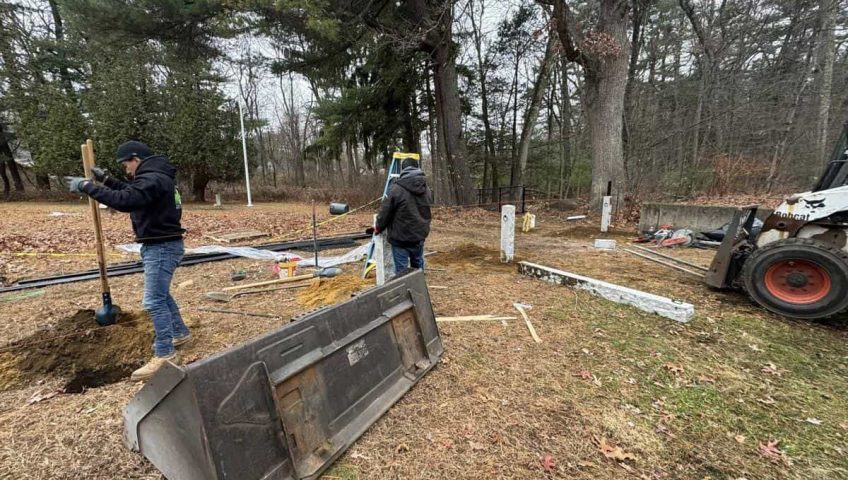 Professional fixing and stabilizing leaning fence post using repair methods without full post removal or digging